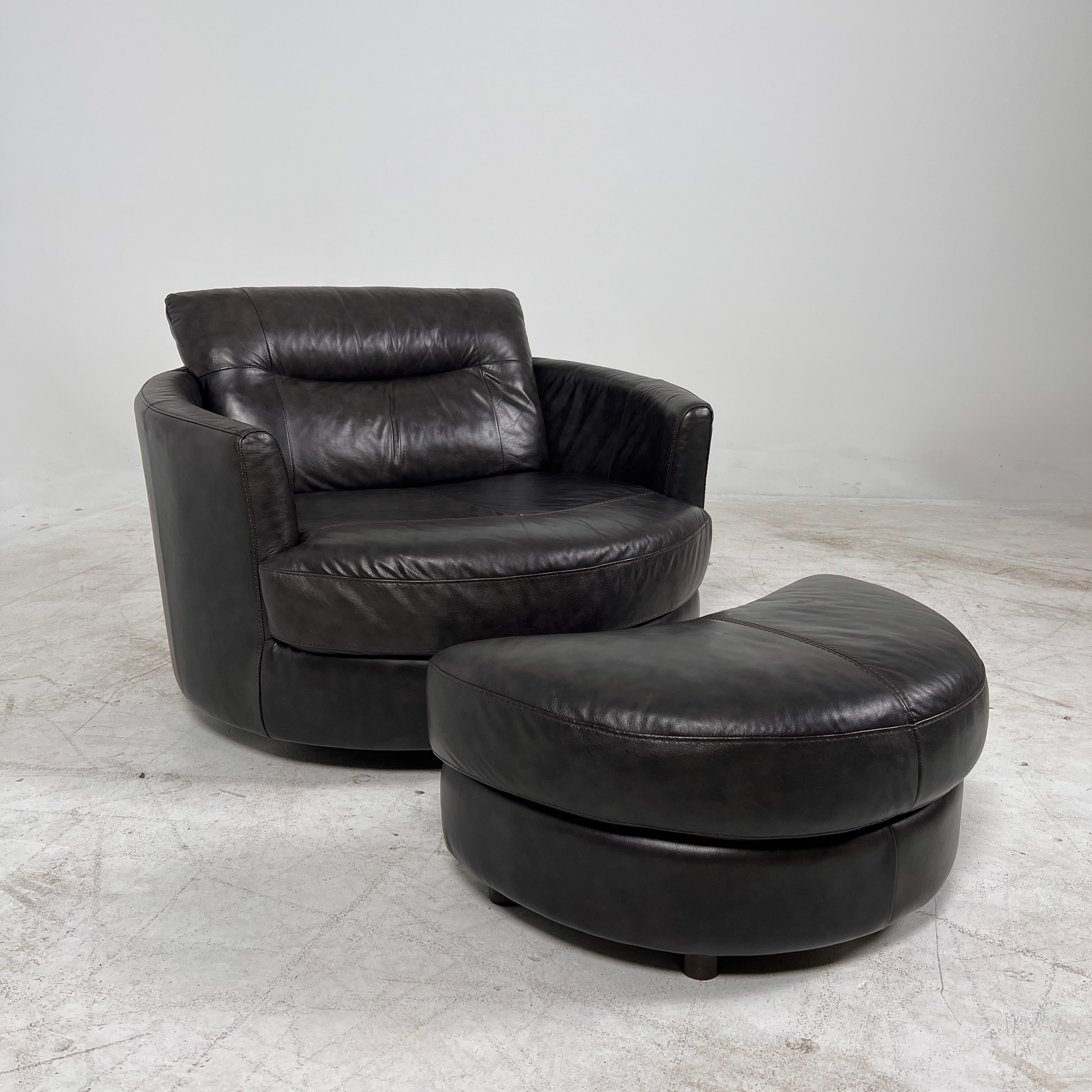 Urban Barn cuddler chair + ottoman. Leather round chair. Delivery available