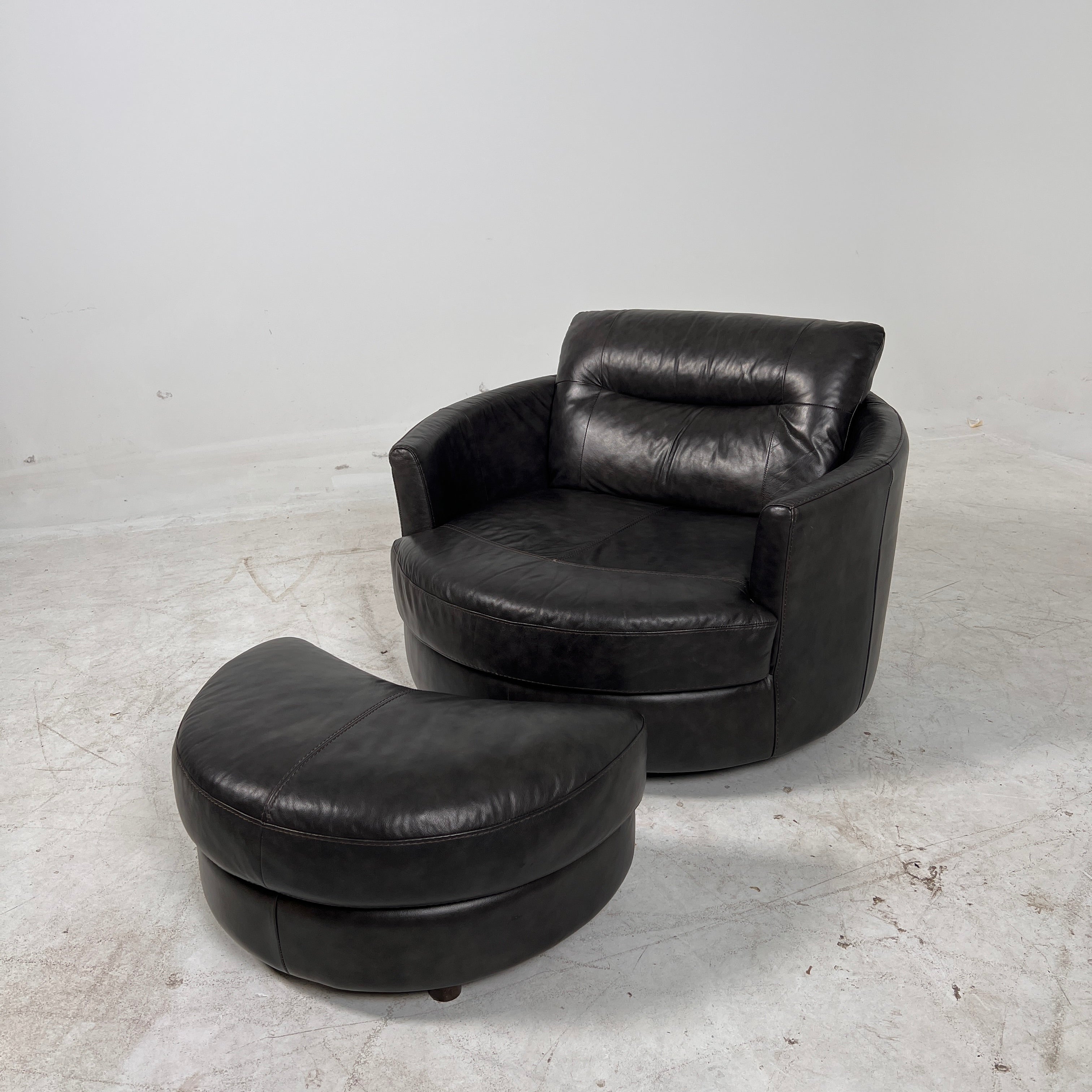 Urban Barn cuddler chair + ottoman. Leather round chair. Delivery available