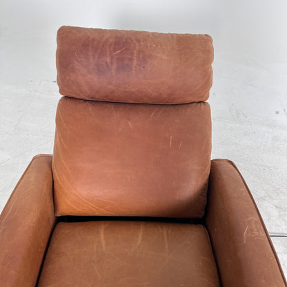 Distressed leather Recliner swivel chair. Leather Armchair.