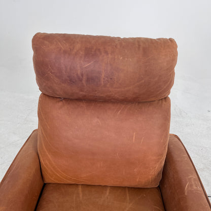 Distressed leather Recliner swivel chair. Leather Armchair.