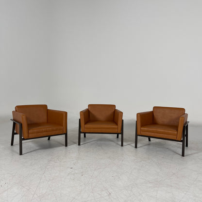 Cognac Armchairs. Faux leather and metal chairs. Delivery available