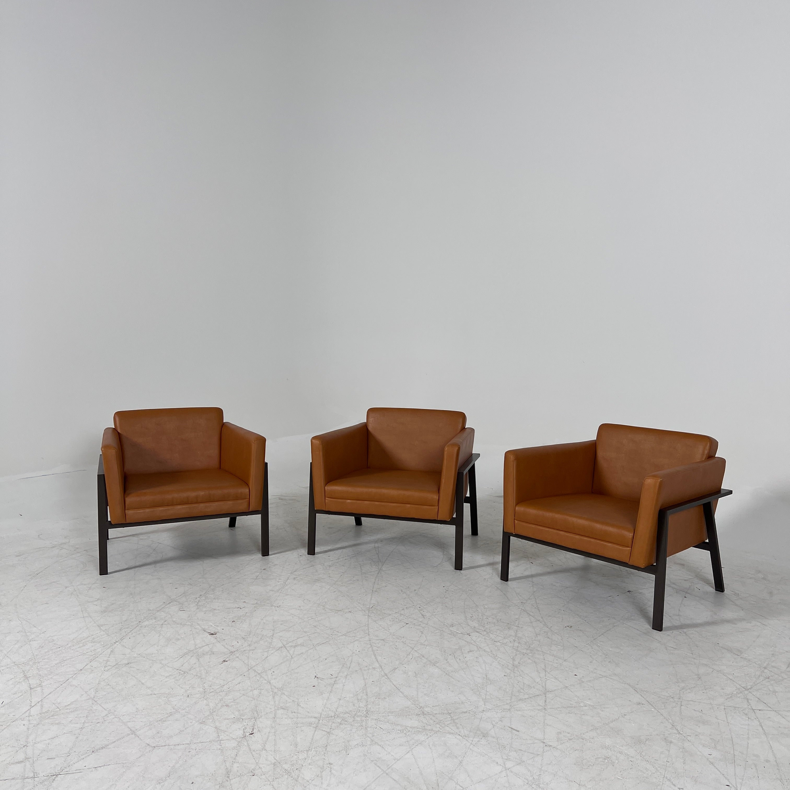 Cognac Armchairs. Faux leather and metal chairs. Delivery available