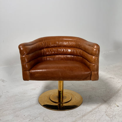 CB2 swivel Armchair. Real Saddle Leather accent chair. Delivery available