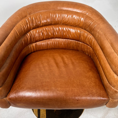 CB2 swivel Armchair. Real Saddle Leather accent chair. Delivery available