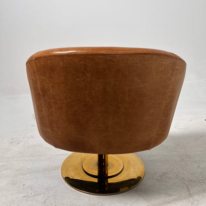 CB2 swivel Armchair. Real Saddle Leather accent chair. Delivery available