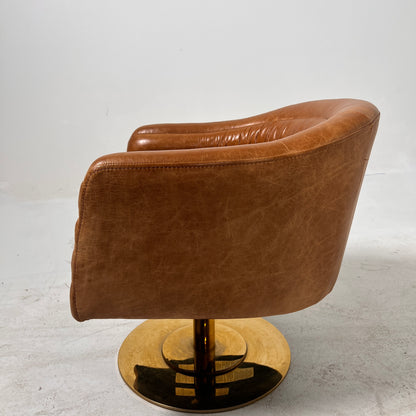 CB2 swivel Armchair. Real Saddle Leather accent chair. Delivery available