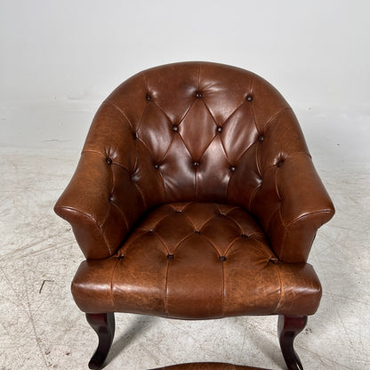 Profilia Leather Armchair plus ottoman. Decorative chair.