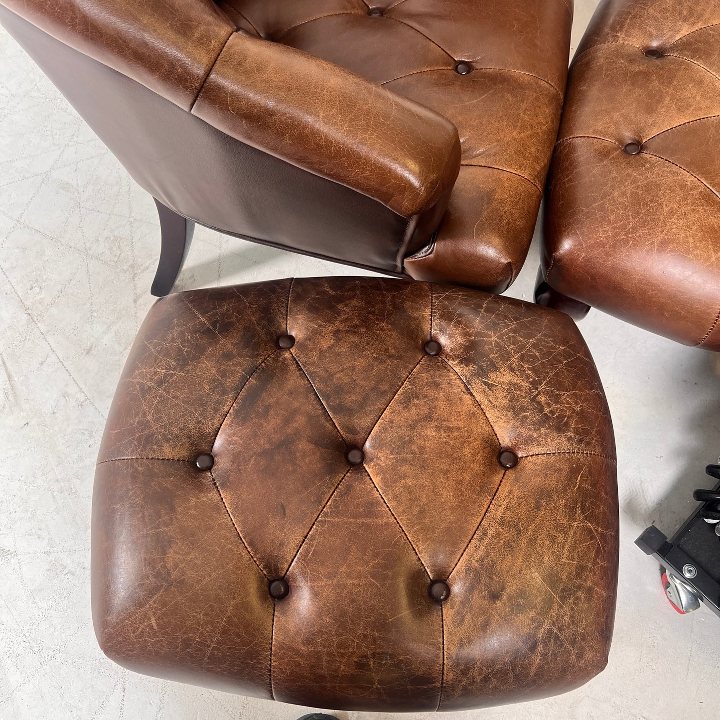 Profilia Leather Armchair plus ottoman. Decorative chair.