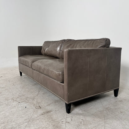 McCreary Leather Sofa. large loveseat or small 3 seater couch. Delivery available