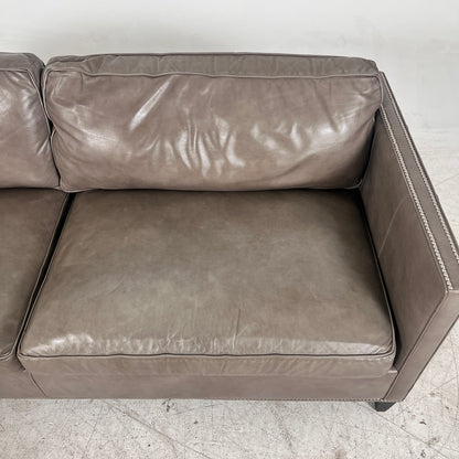 McCreary Leather Sofa. large loveseat or small 3 seater couch. Delivery available