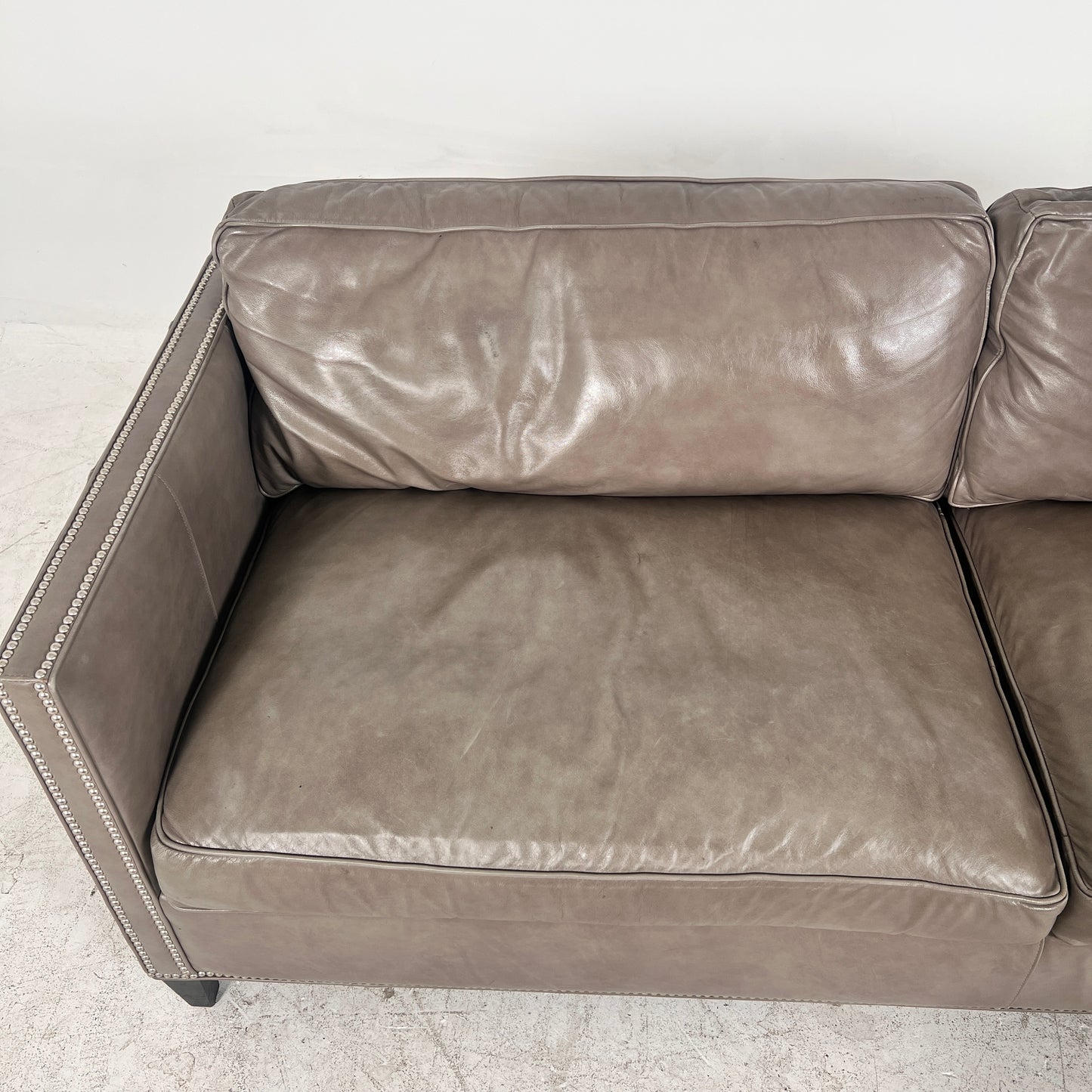 McCreary Leather Sofa. large loveseat or small 3 seater couch. Delivery available