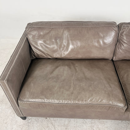 McCreary Leather Sofa. large loveseat or small 3 seater couch. Delivery available