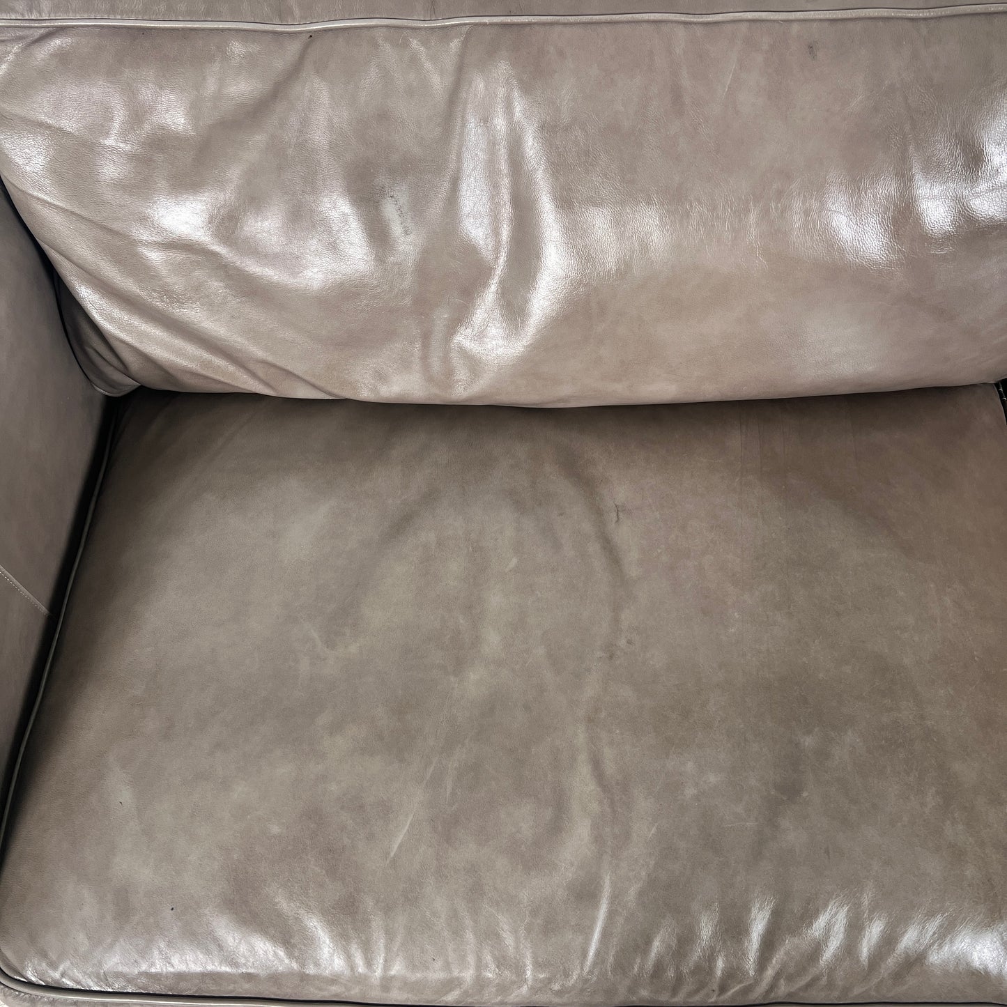 McCreary Leather Sofa. large loveseat or small 3 seater couch. Delivery available
