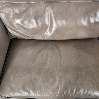McCreary Leather Sofa. large loveseat or small 3 seater couch. Delivery available