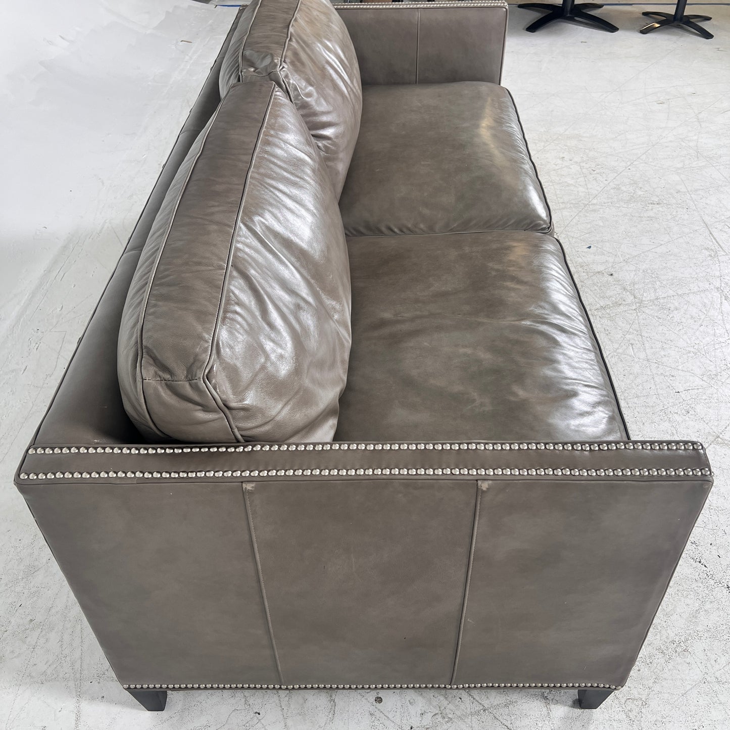 McCreary Leather Sofa. large loveseat or small 3 seater couch. Delivery available