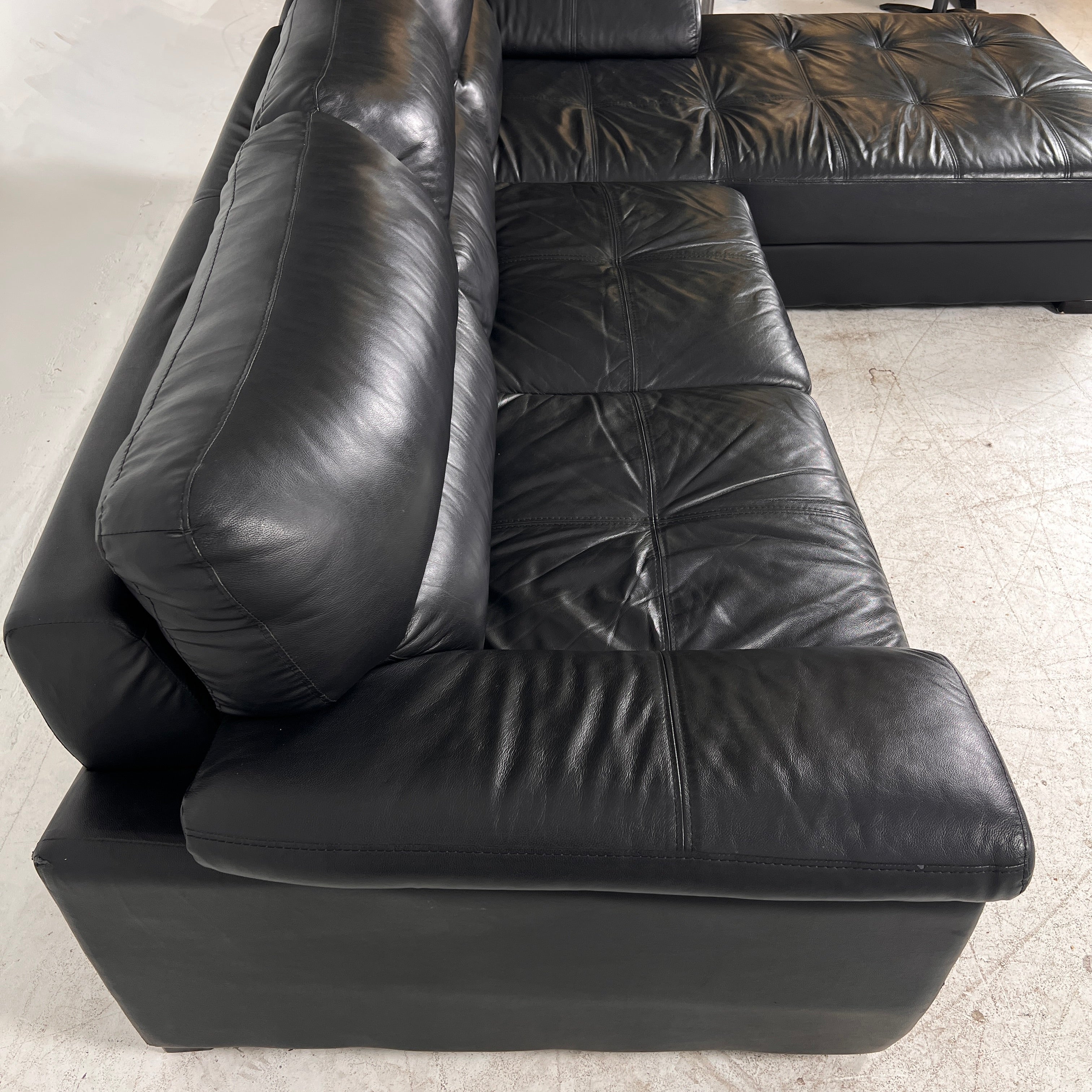 Black Leather Sectional. L shaped sofa couch. Delivery available