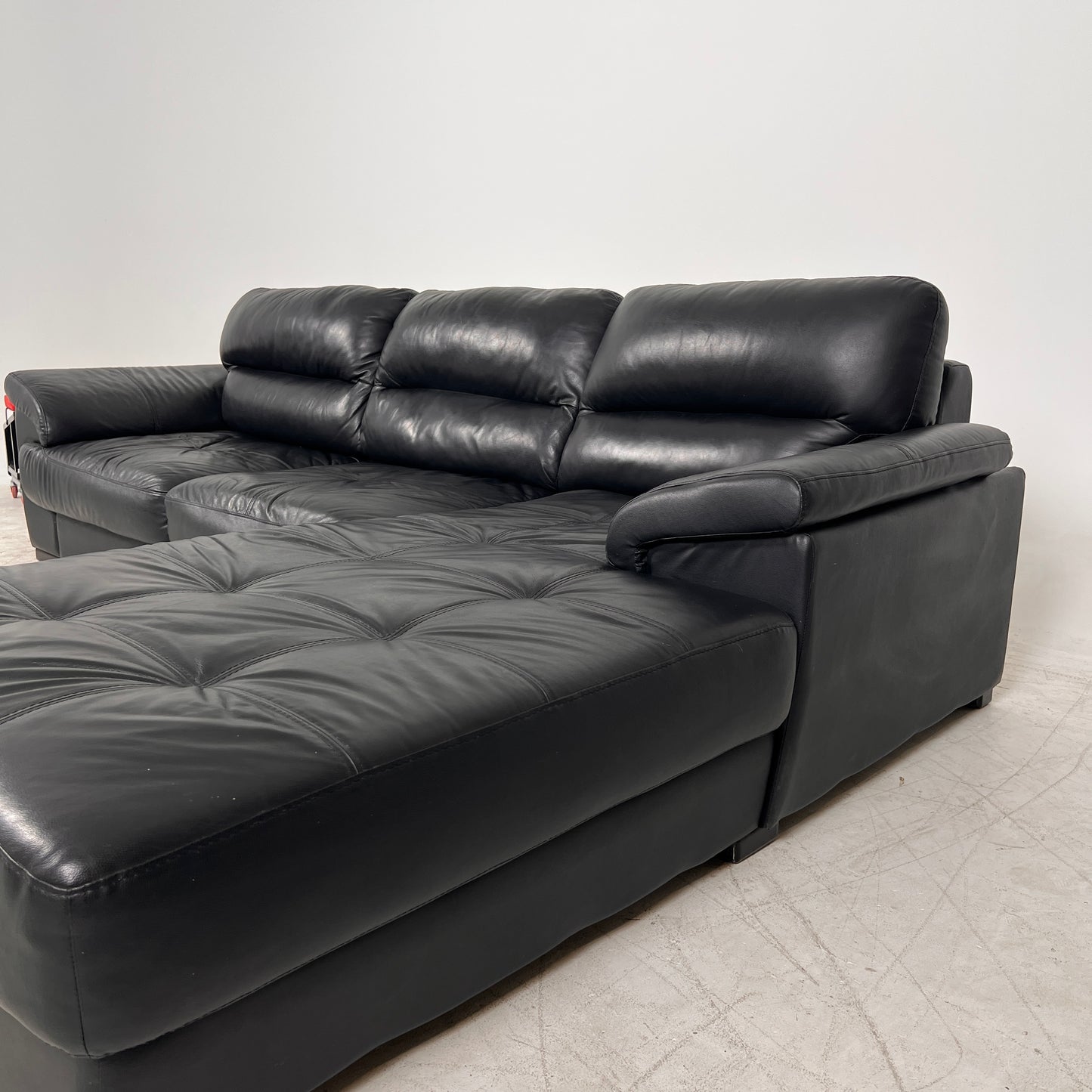 Black Leather Sectional. L shaped sofa couch. Delivery available