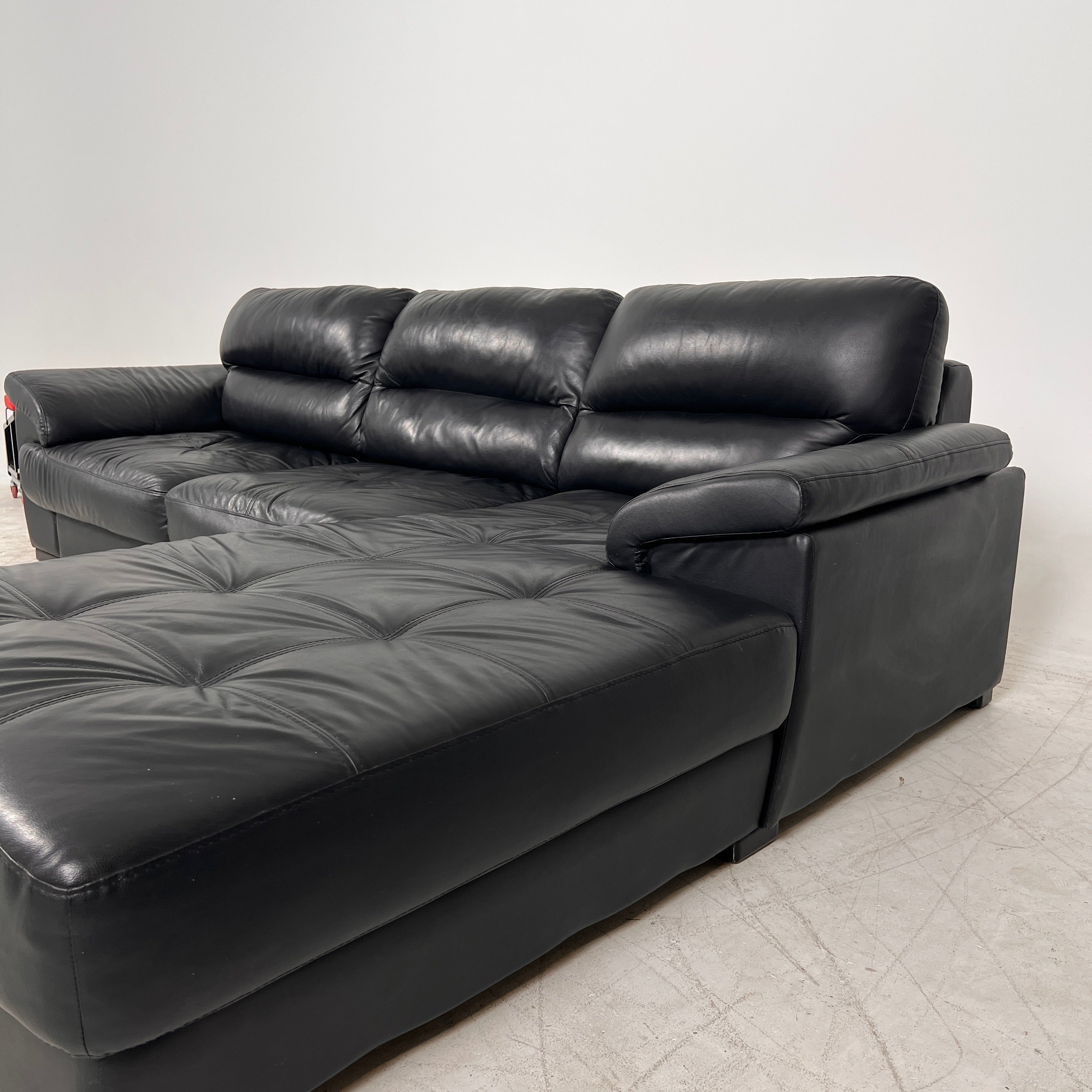 Black Leather Sectional. L shaped sofa couch. Delivery available