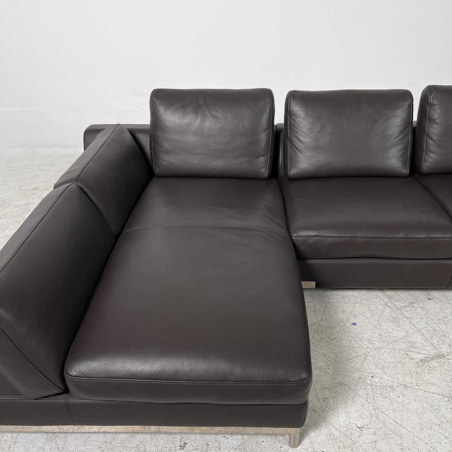 Kelvin Giormani Sectional. Leather L shaped sofa couch. Delivery available