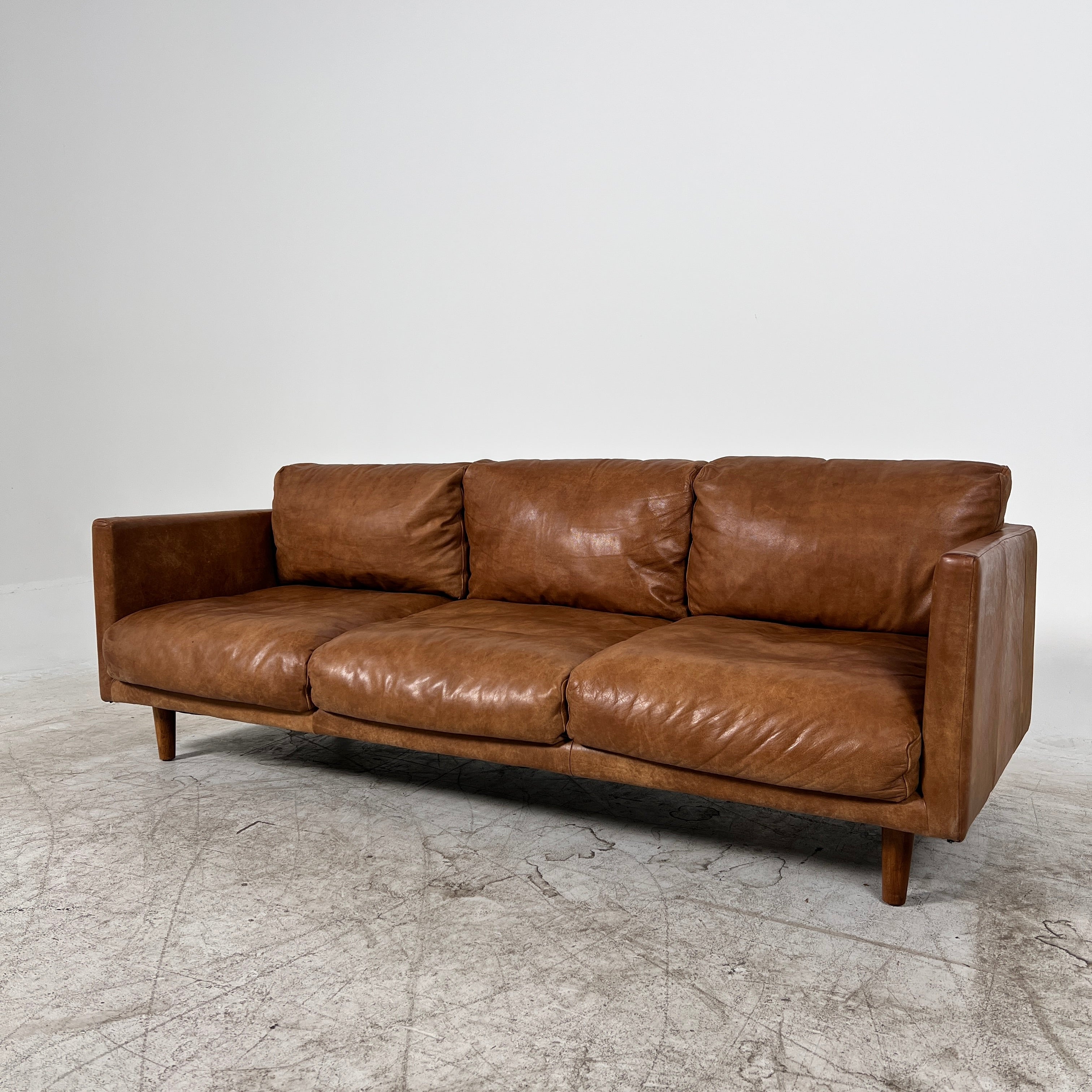 Article Nirvana Leather Sofa. 3 seater Distressed leather couch. Delivery available
