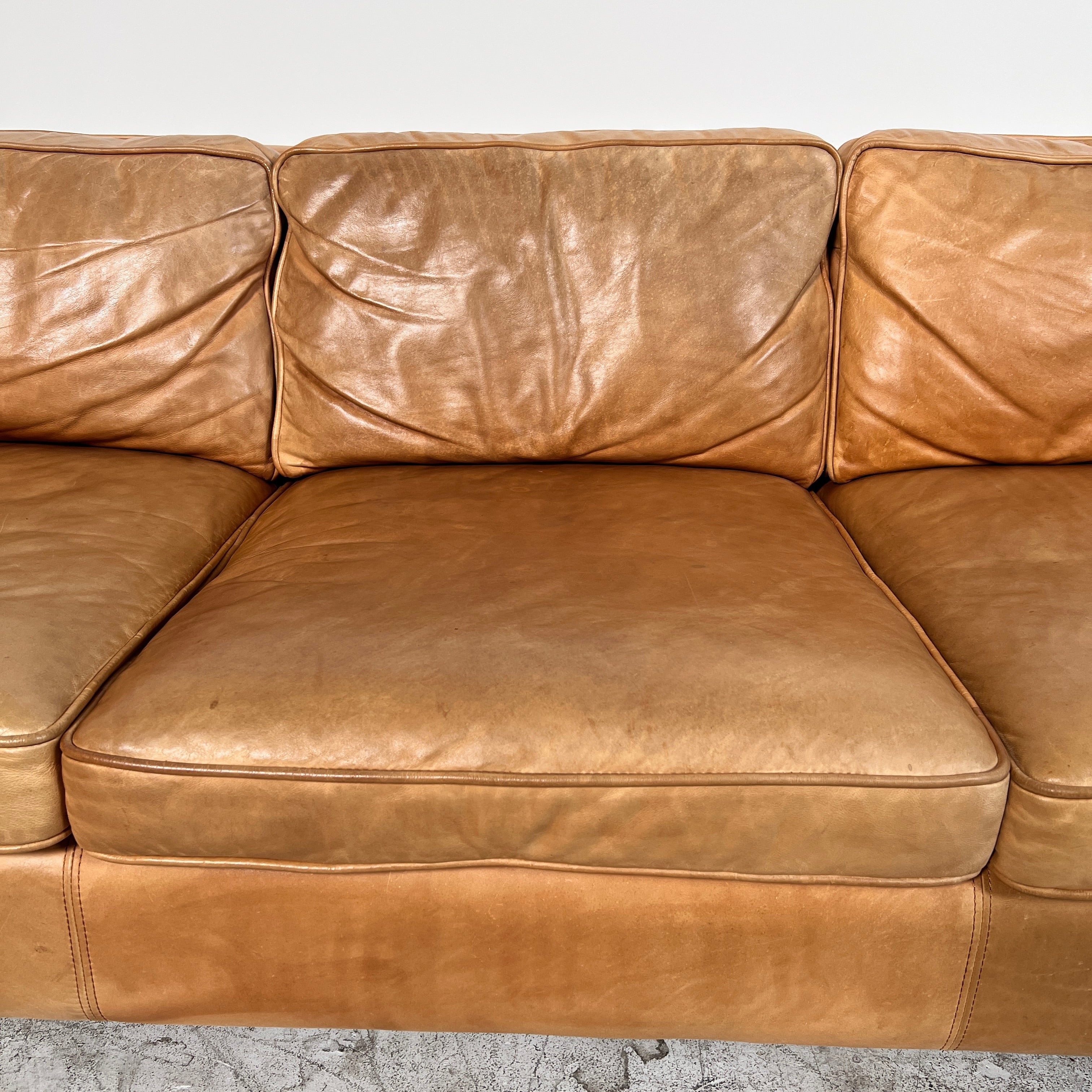West Elm Leather Sofa. Aniline leather 3 seater couch. Delivery available