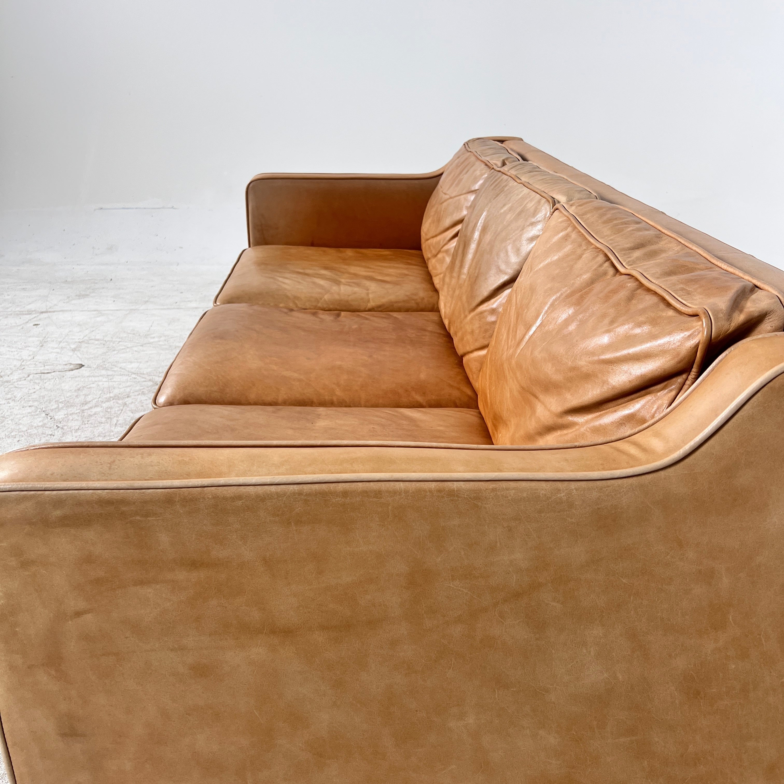 West Elm Leather Sofa. Aniline leather 3 seater couch. Delivery available