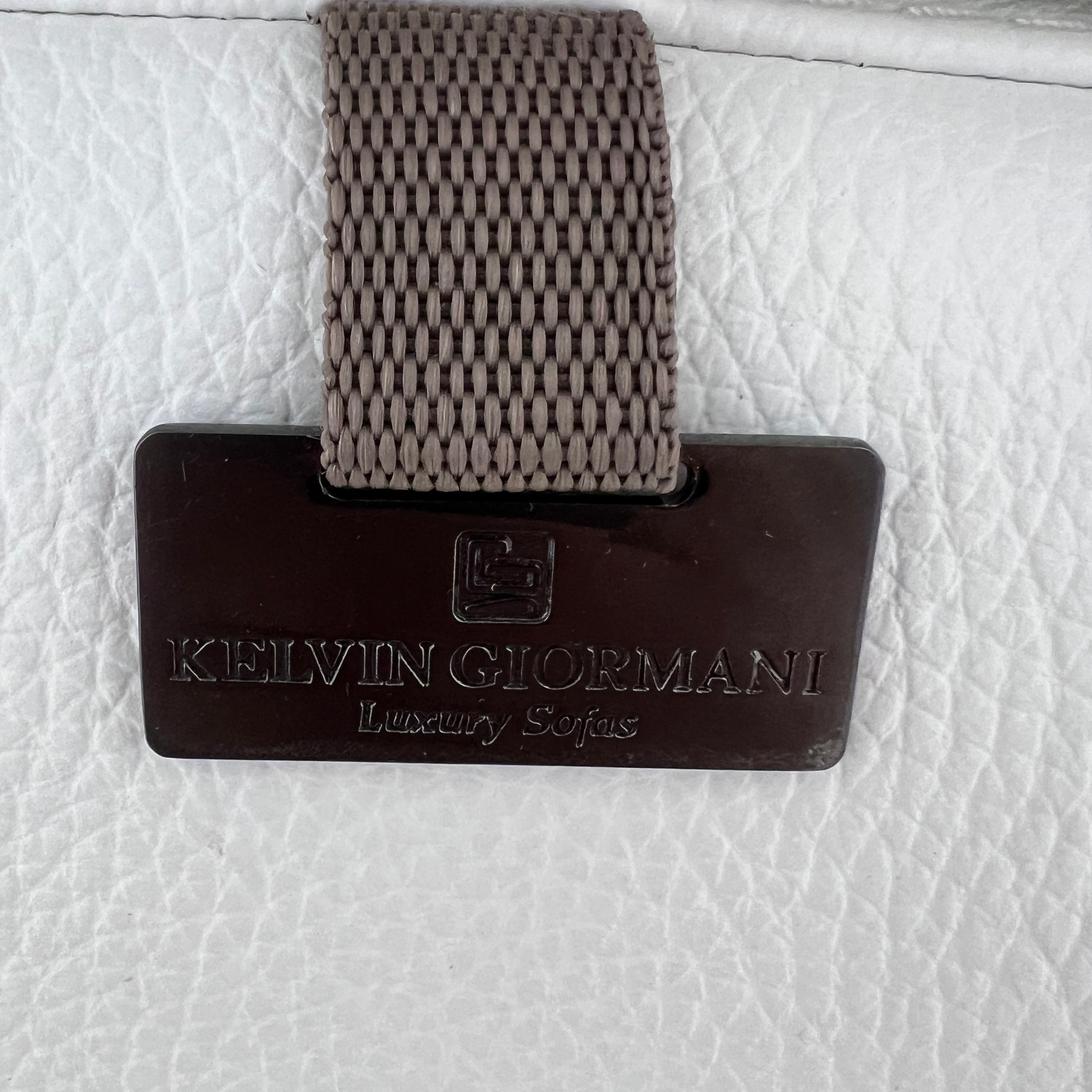 Kelvin Giormani Leather Sectional. White L shaped sofa couch. Delivery available
