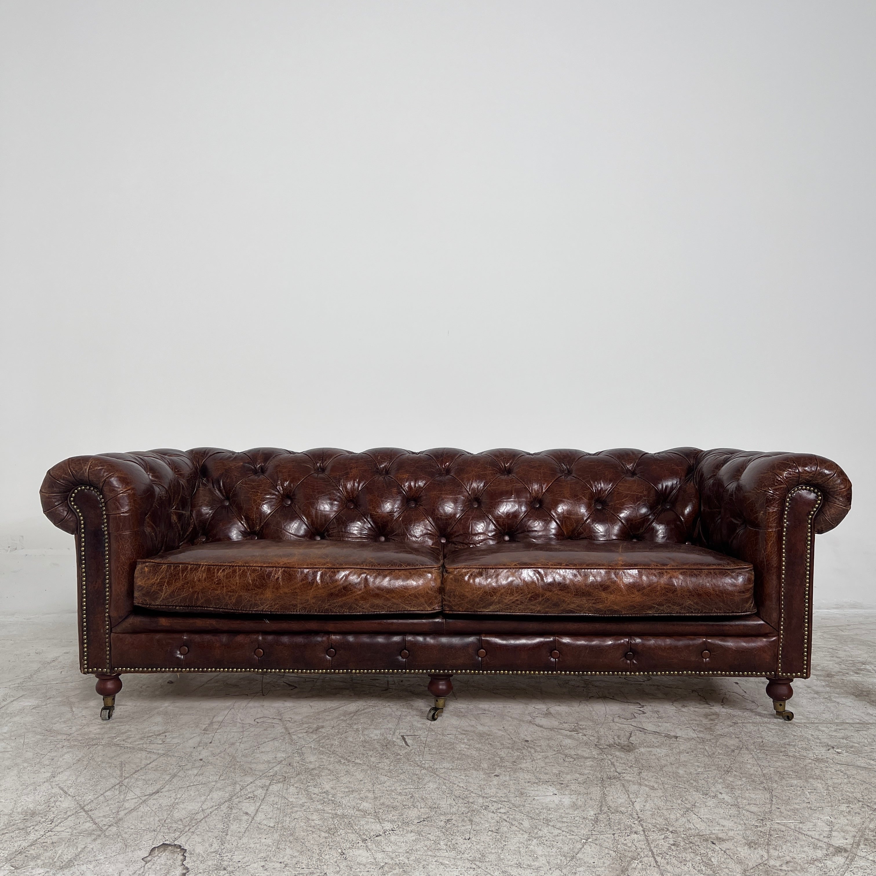 Moe's Chesterfield leather Sofa. Distressed leather Sofa couch. Delivery available