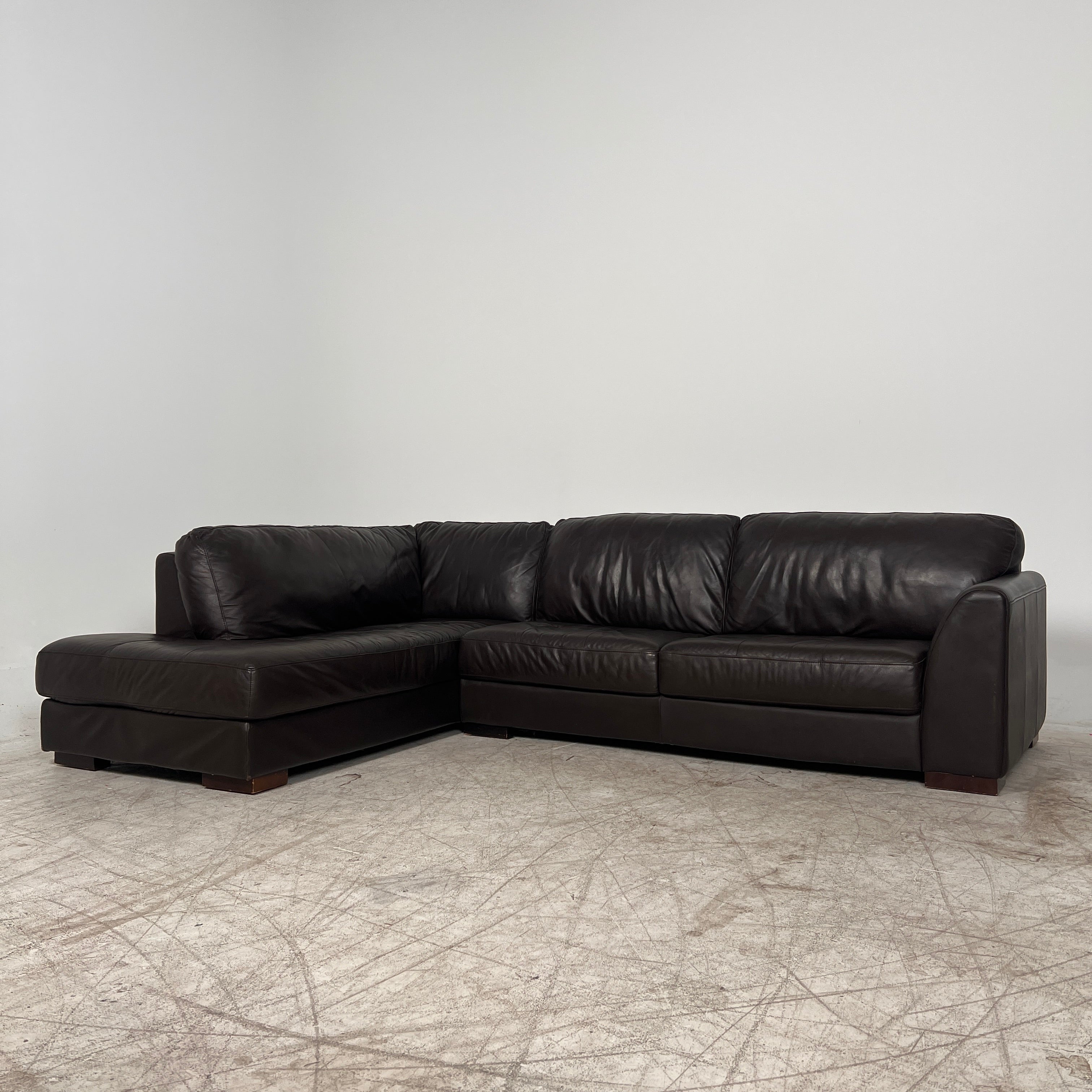 Urban Barn leather Sectional. Brown L shaped sofa couch. Delivery available