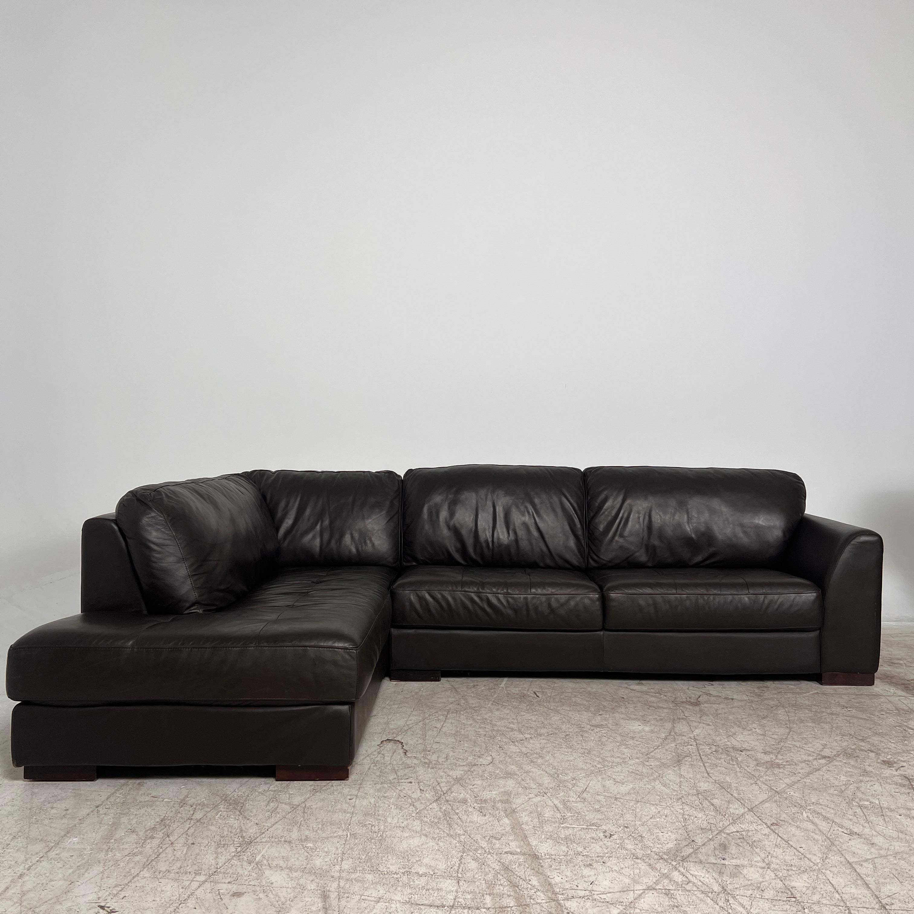Urban Barn leather Sectional. Brown L shaped sofa couch. Delivery available