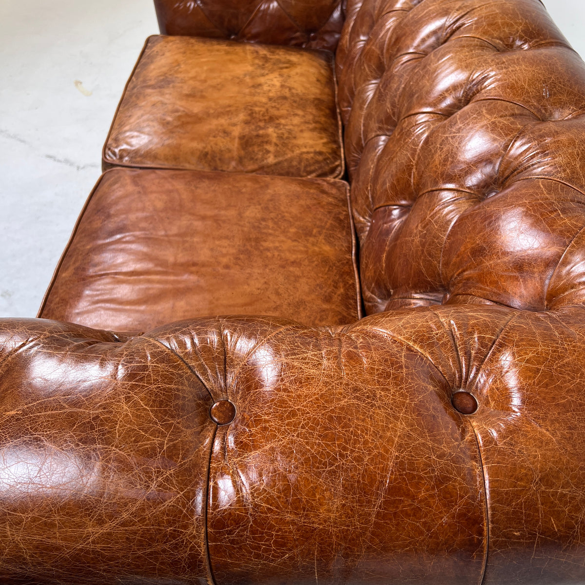 Moe's Chesterfield leather loveseat. Genuine Distressed leather sofa couch. Delivery available