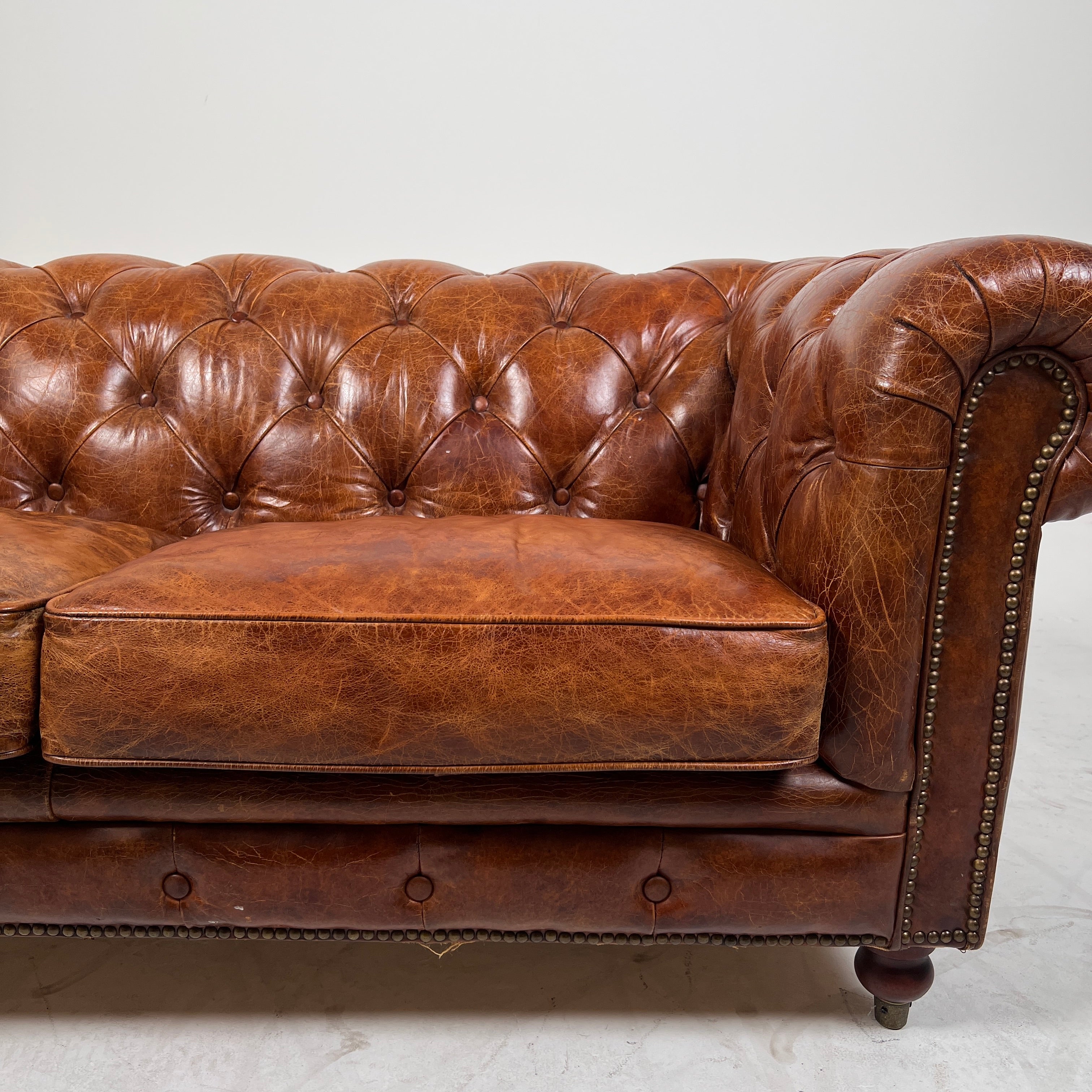 Moe's Chesterfield leather loveseat. Genuine Distressed leather sofa couch. Delivery available