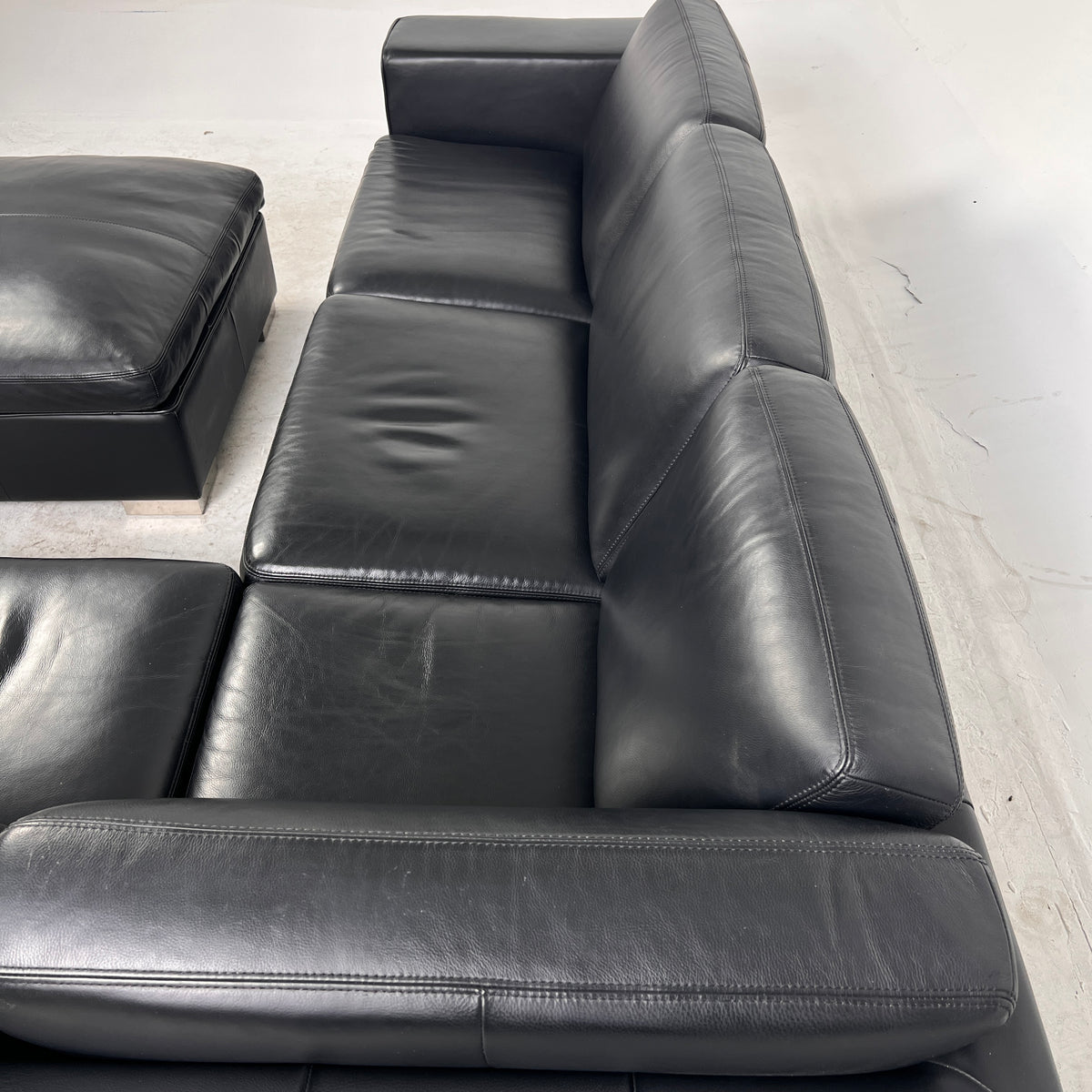 Down Filled Leather Sectional. L shaped sofa couch. Delivery available