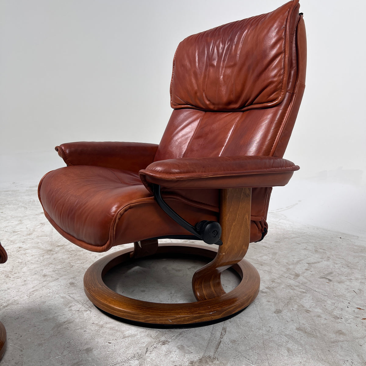 Ekornes Stressless Leather chair + ottoman. Cognac Brown recliner chair.