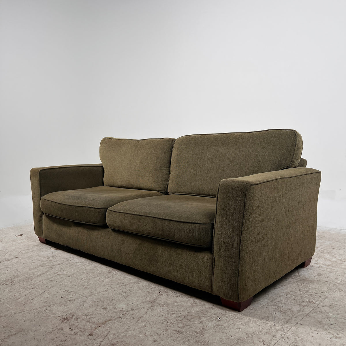 Green 3 seater couch. sofa $150 bucks. We can deliver