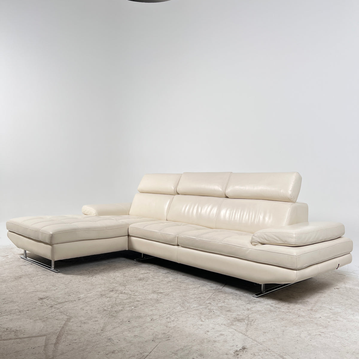 Rozzini Leather Sectional. Real leather L shaped sofa couch. Delivery available