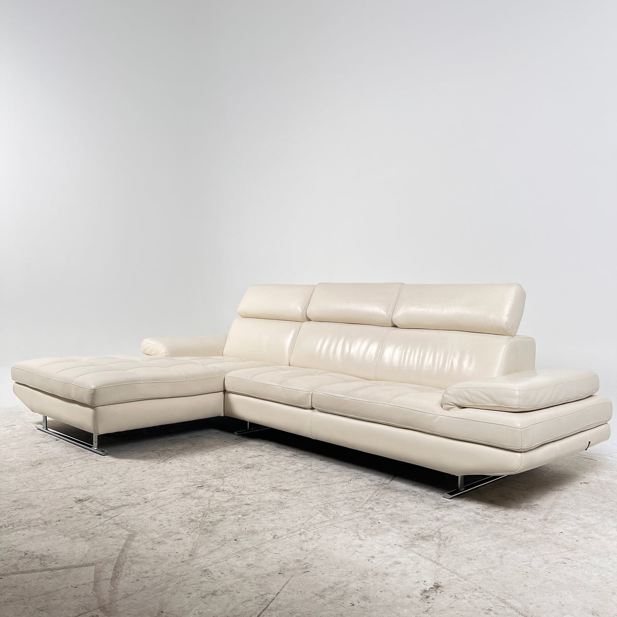 Rozzini Leather Sectional. Real leather L shaped sofa couch. Delivery available