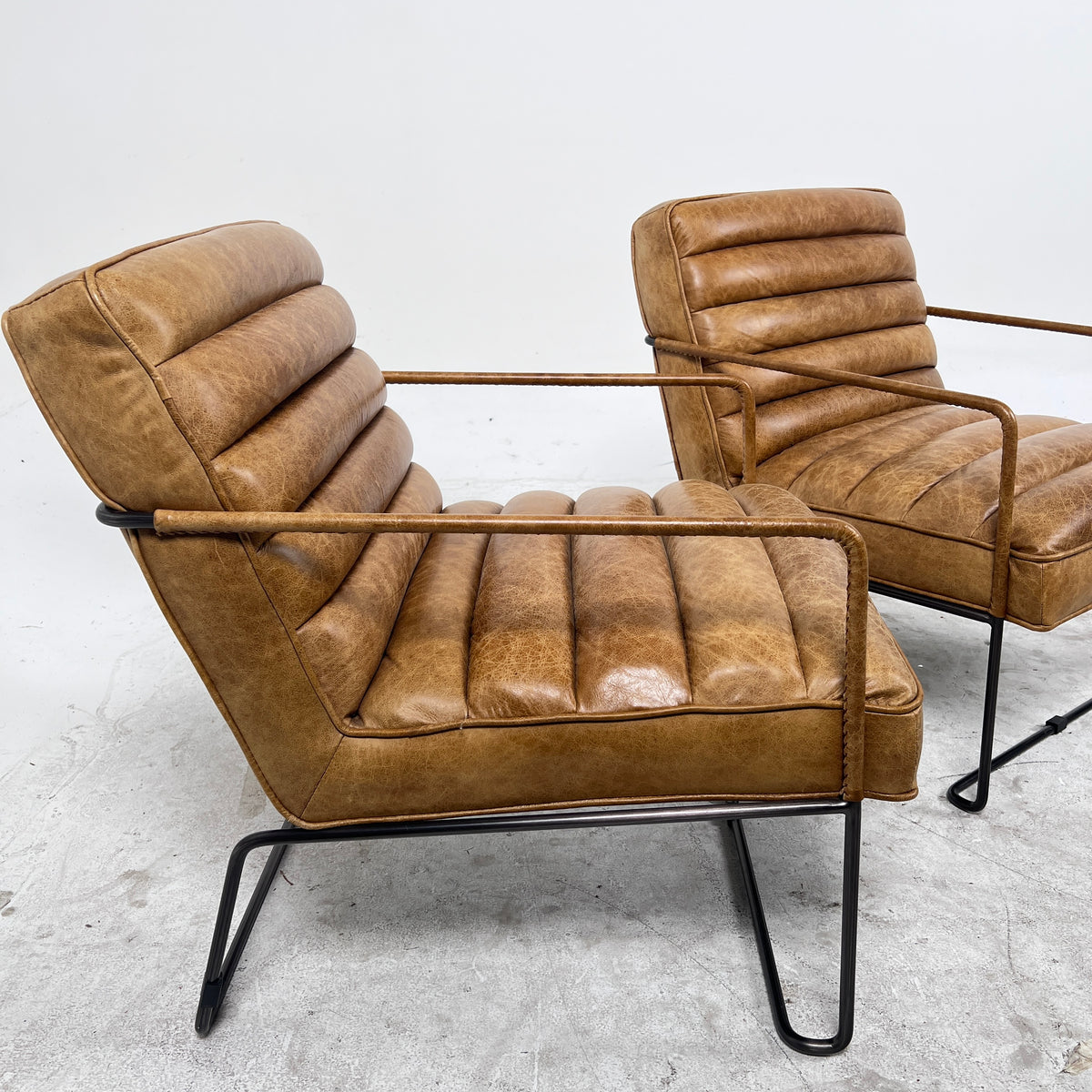 Urban Barn Distressed leather Armchair. Matching Chairs.