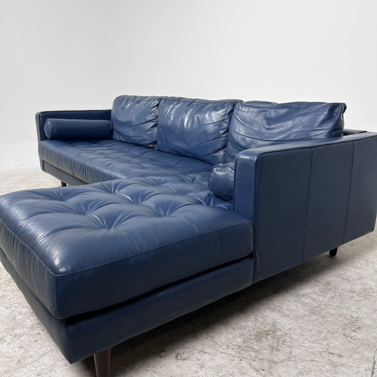Article Sven Leather Sectional. Blue L shaped sofa couch. Delivery available
