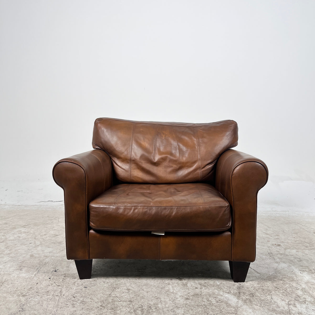 Genuine Leather Armchair. Rolled arms cigar style chair. delivery available