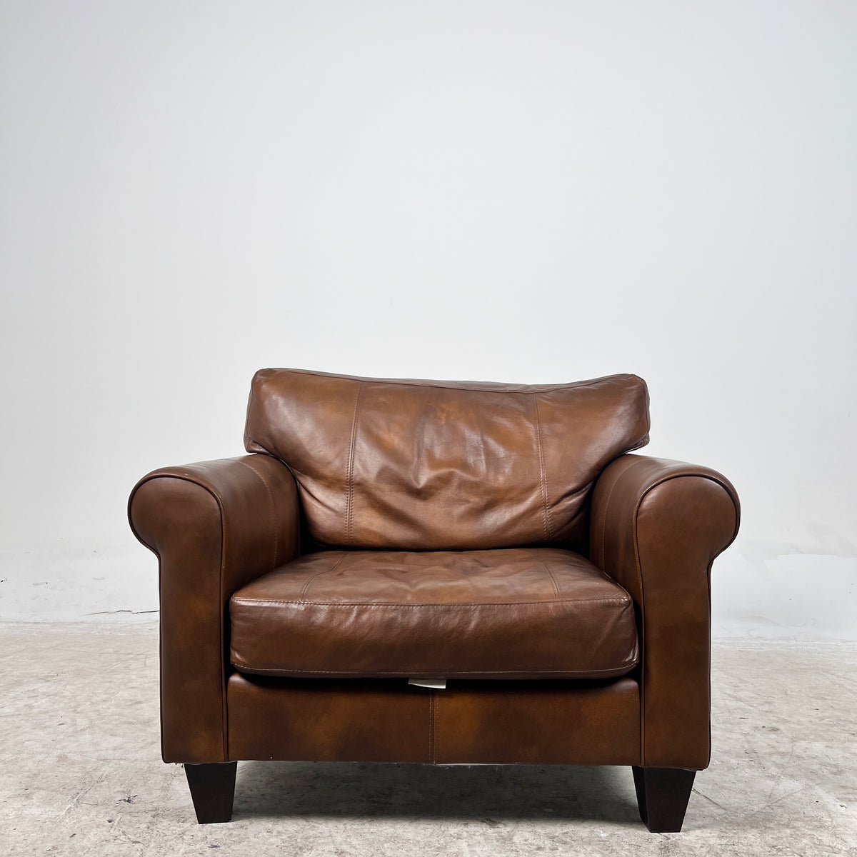 Genuine Leather Armchair. Rolled arms cigar style chair. delivery available