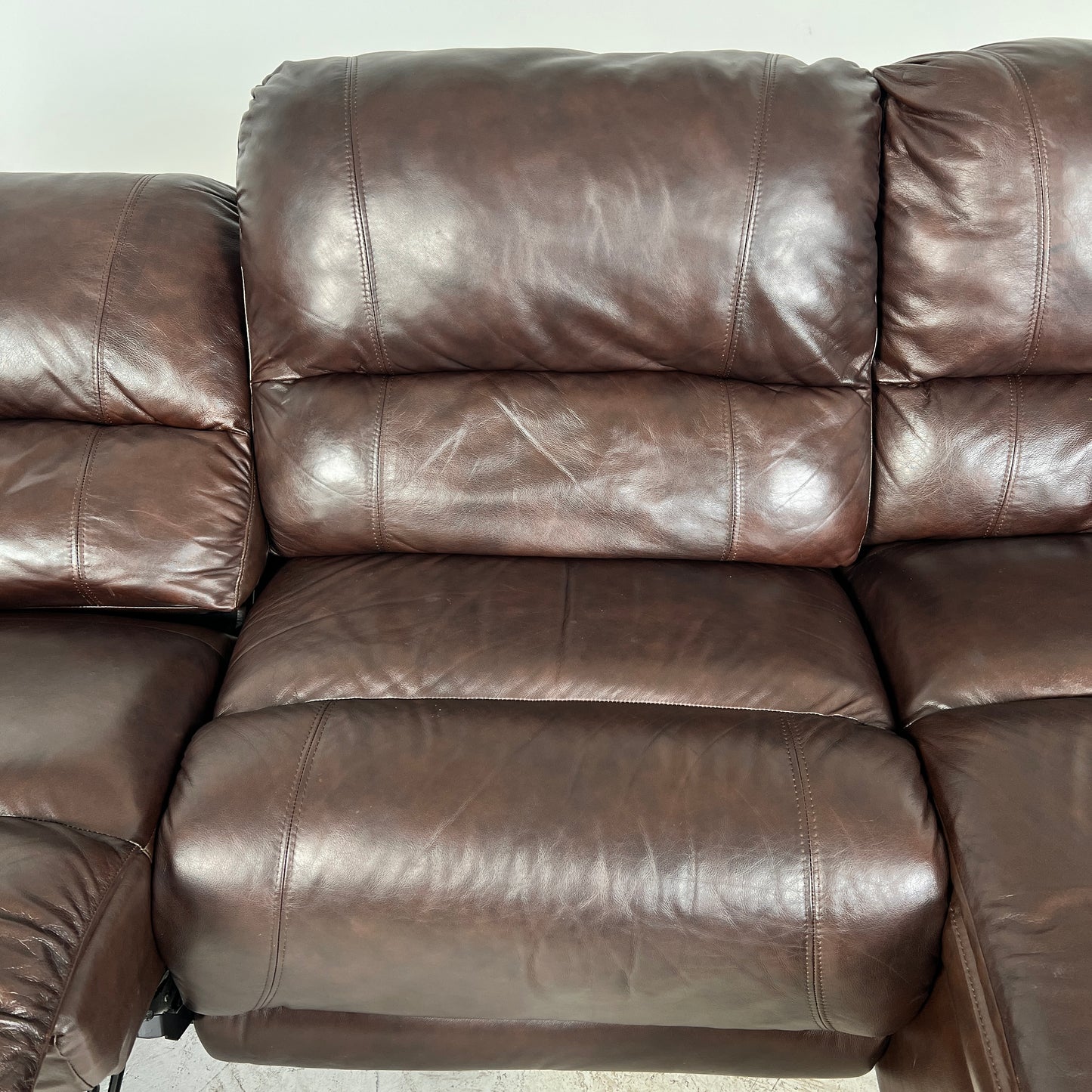 Genuine Leather Recliner Sectional. brown L shaped sofa couch