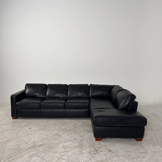 Natuzzi Editions Leather Sectional. Black L shaped sofa couch.