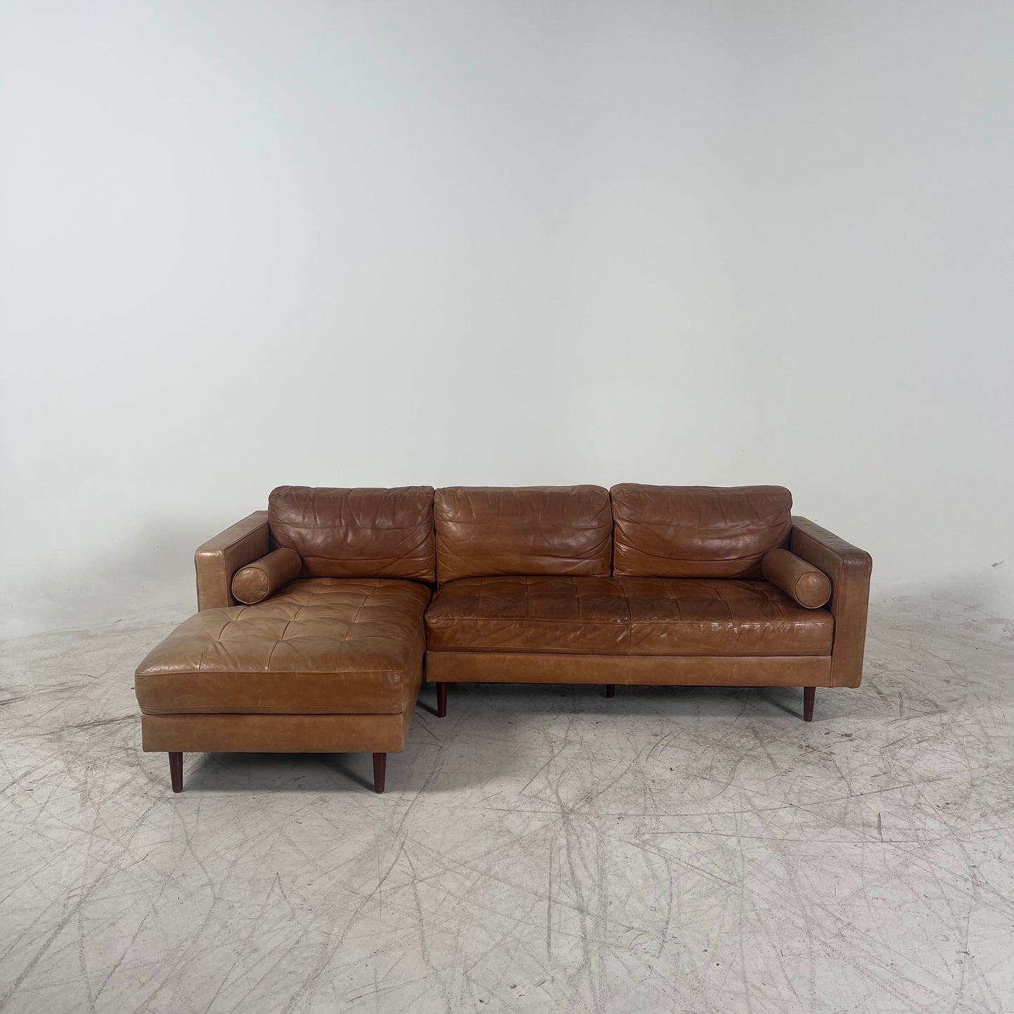 Mid century Cognac leather sectional. L shaped sofa couch.
