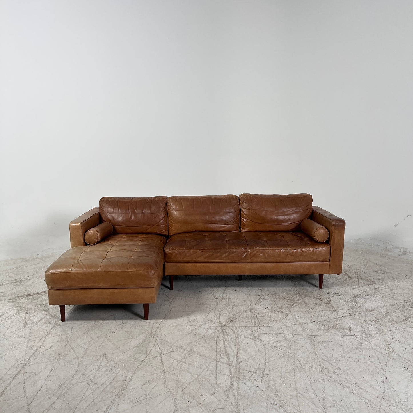 Mid century Cognac leather sectional. L shaped sofa couch.