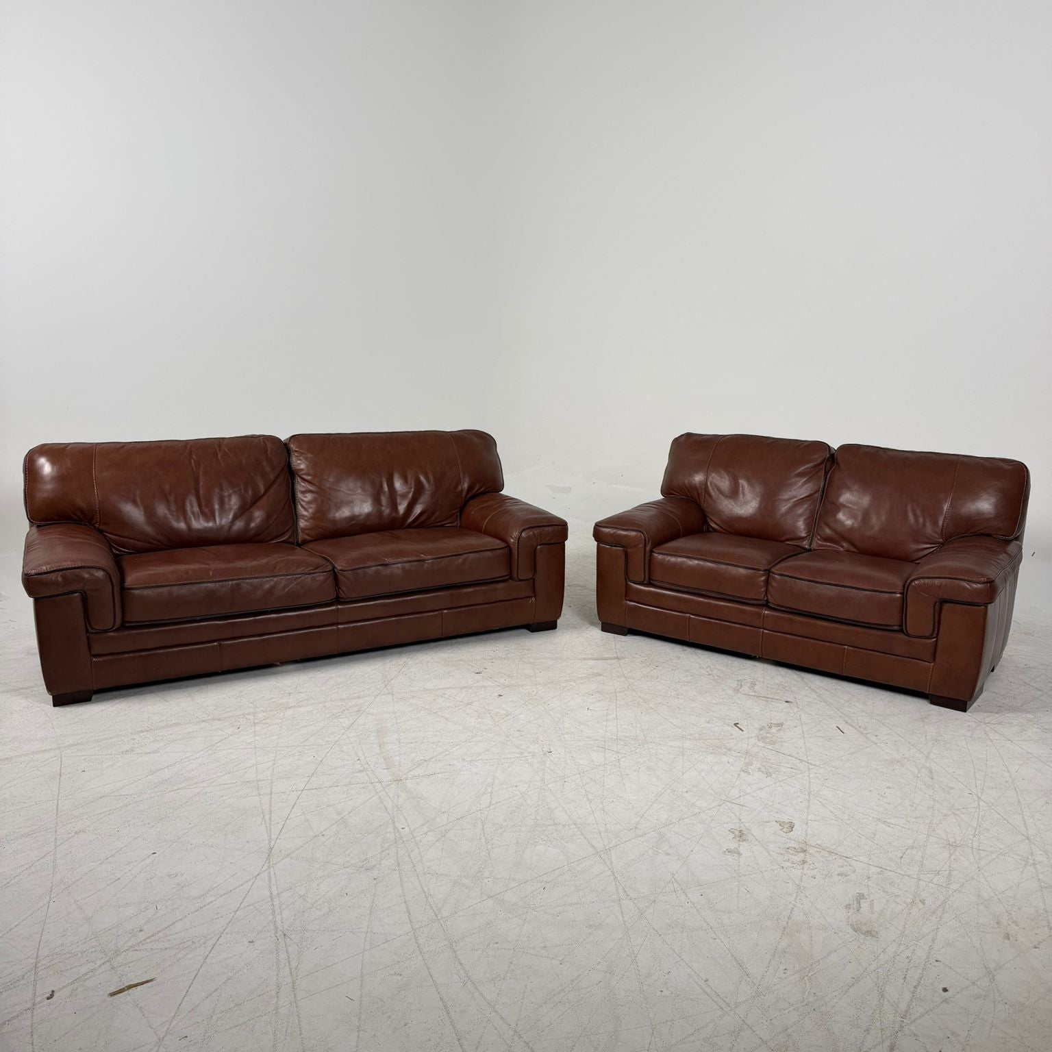 Leon's Leather Sofa set. 3+2 Couch + Loveseat set. Delivery Available
