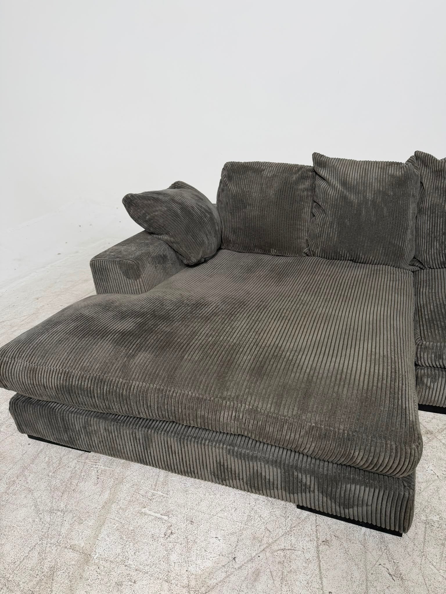 Moe's plunge sectional. Reversible L shaped sofa couch. Delivery available