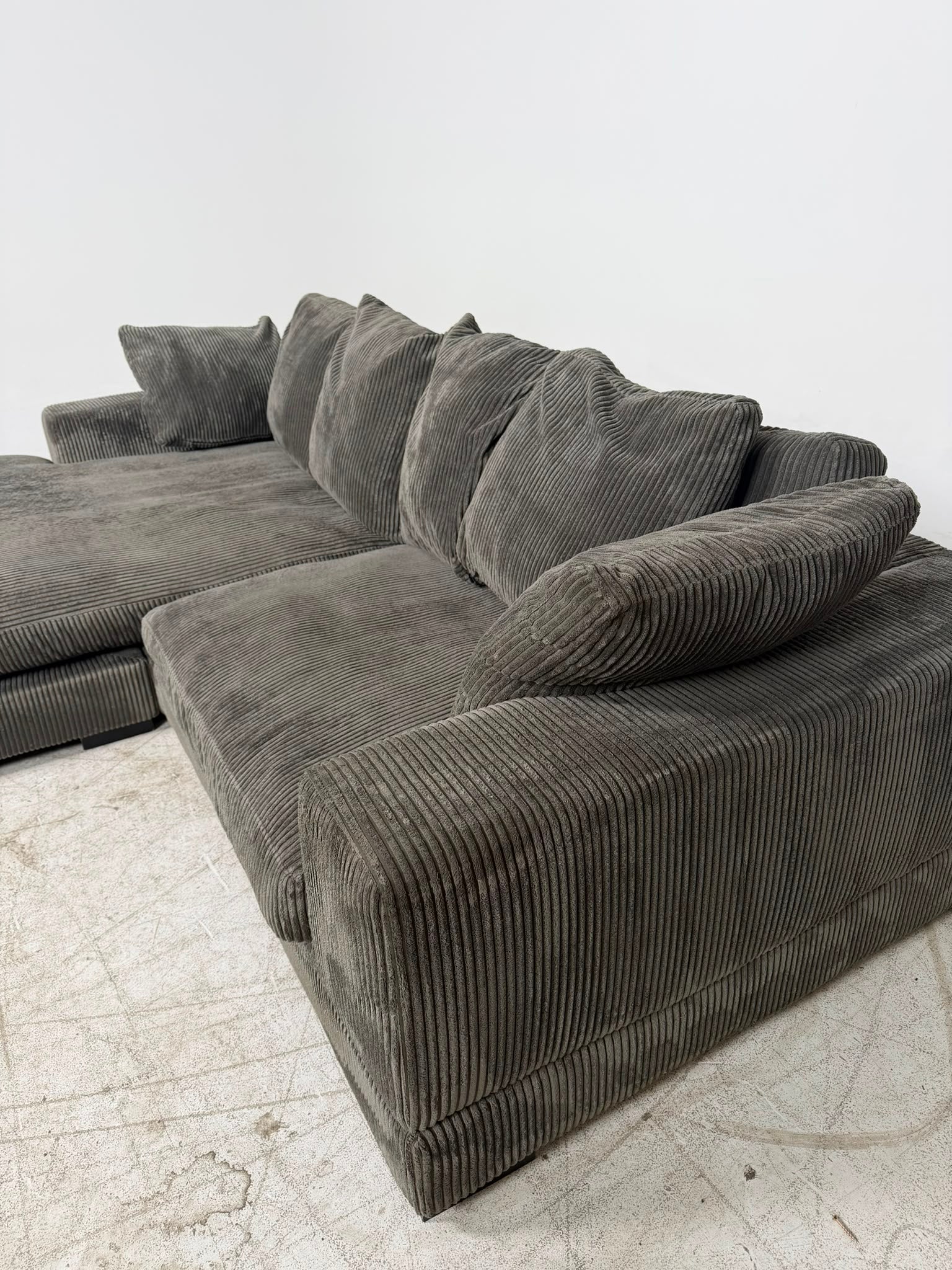 Moe's plunge sectional. Reversible L shaped sofa couch. Delivery available