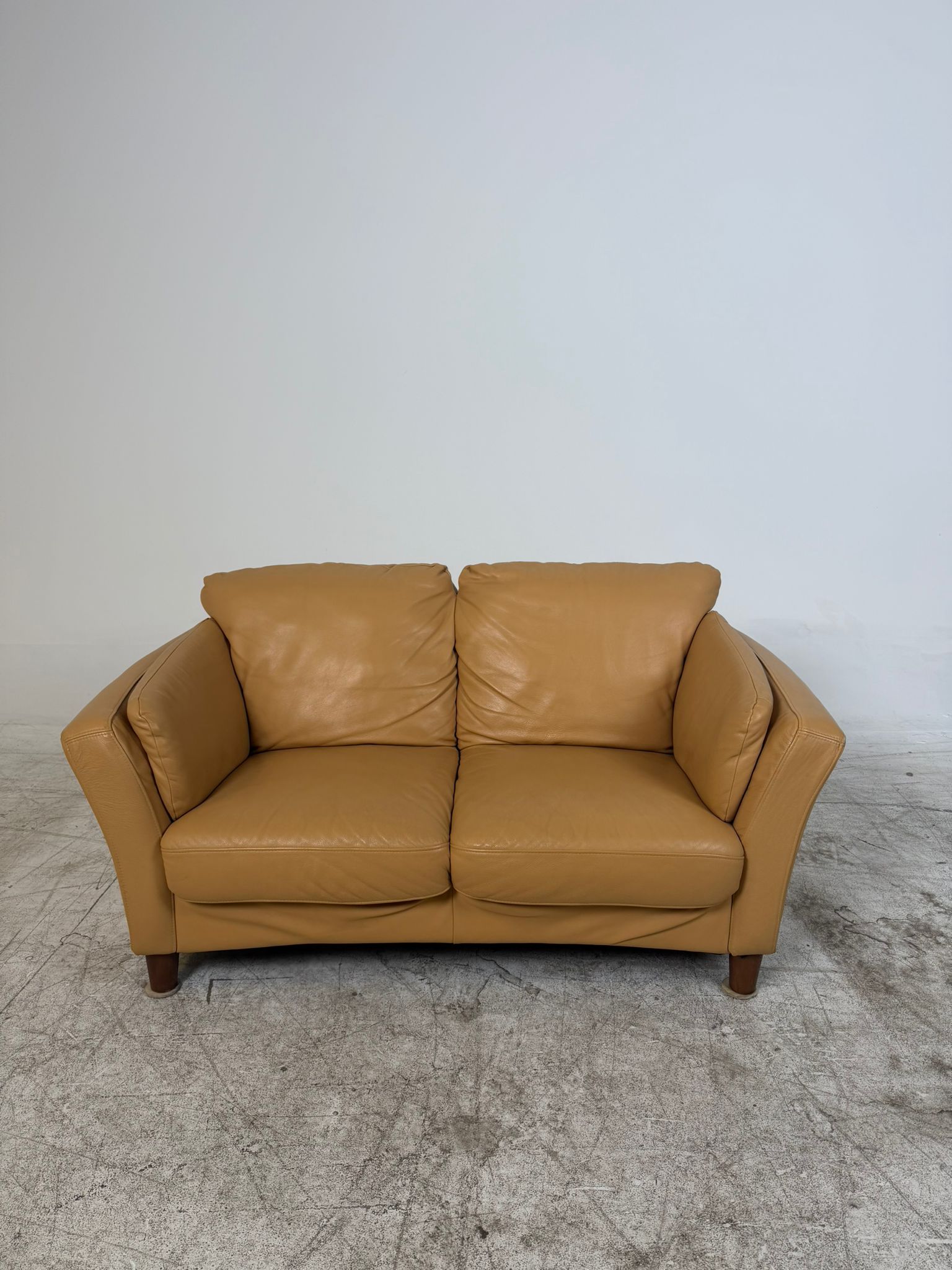 MCM Leather Loveseat. Caramel 2 seater sofa couch. Delivery available