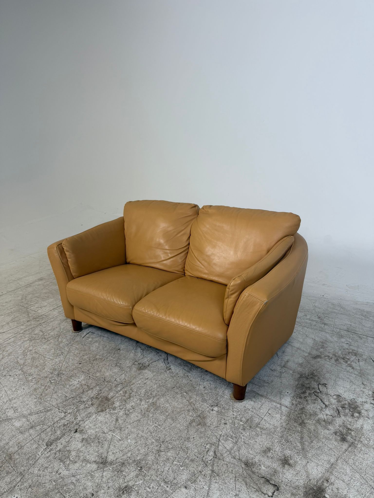 MCM Leather Loveseat. Caramel 2 seater sofa couch. Delivery available